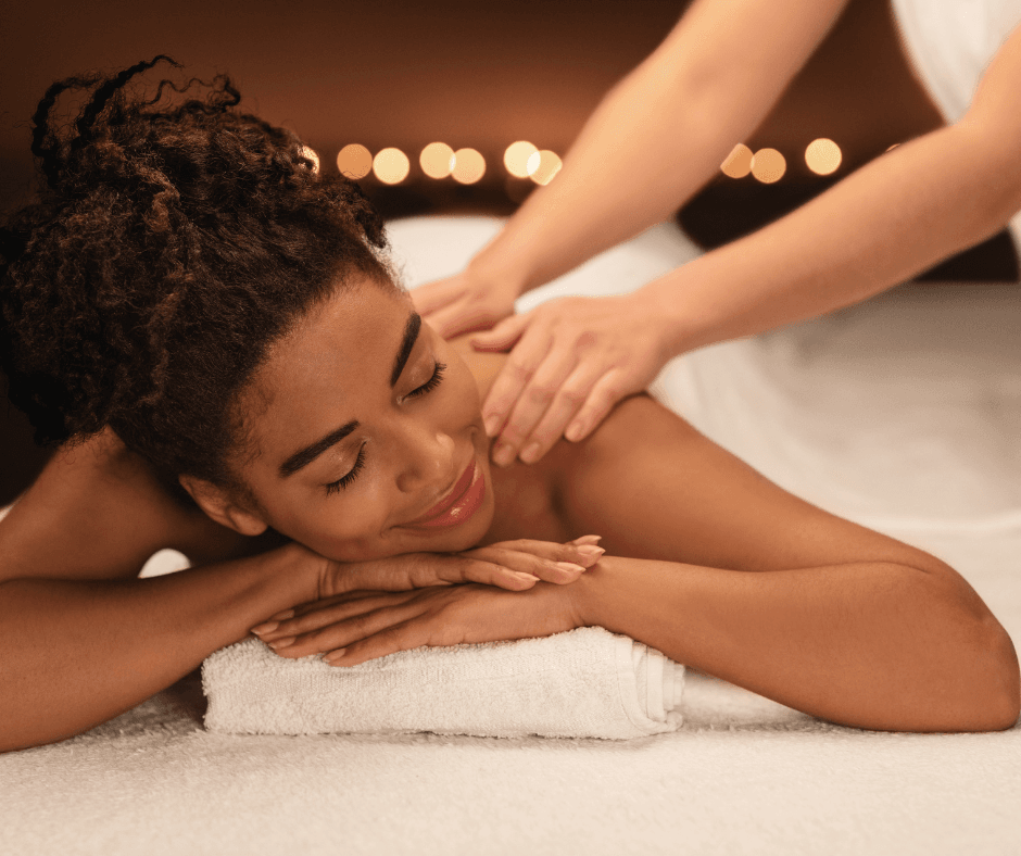 A women laying on massage table and relaxing